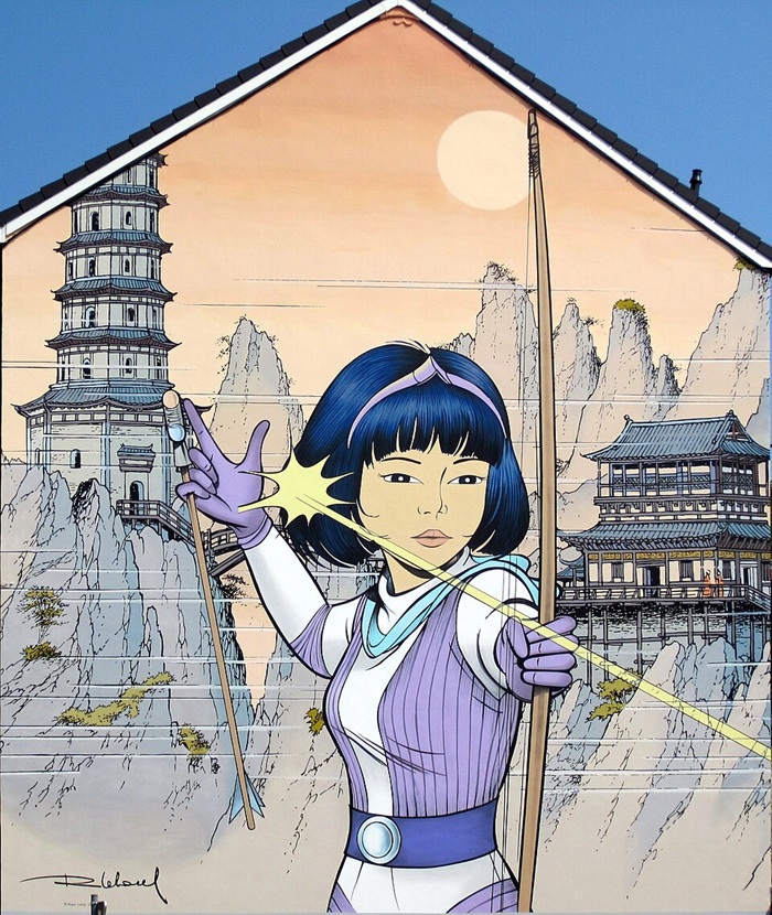Yoko Tsuno, fresque murale à Verviers réalisée en 2018 dans le cadre du "Parcours BD" de Bruxelles | Source illustration : Par The RedBurn — Travail personnel, CC BY-SA 4.0, https://commons.wikimedia.org/w/index.php?curid=72096937